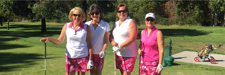 Golf tournament players posing